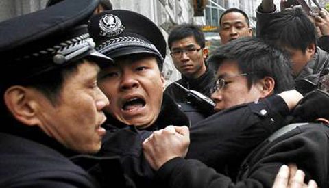Chinese police arresting members of Beijing's Shouwang Church in 2012